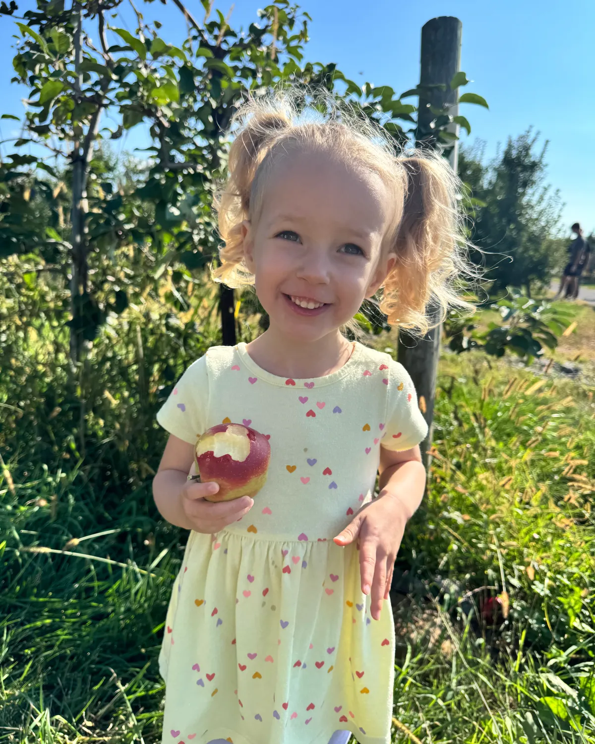 Mya smiling outdoors